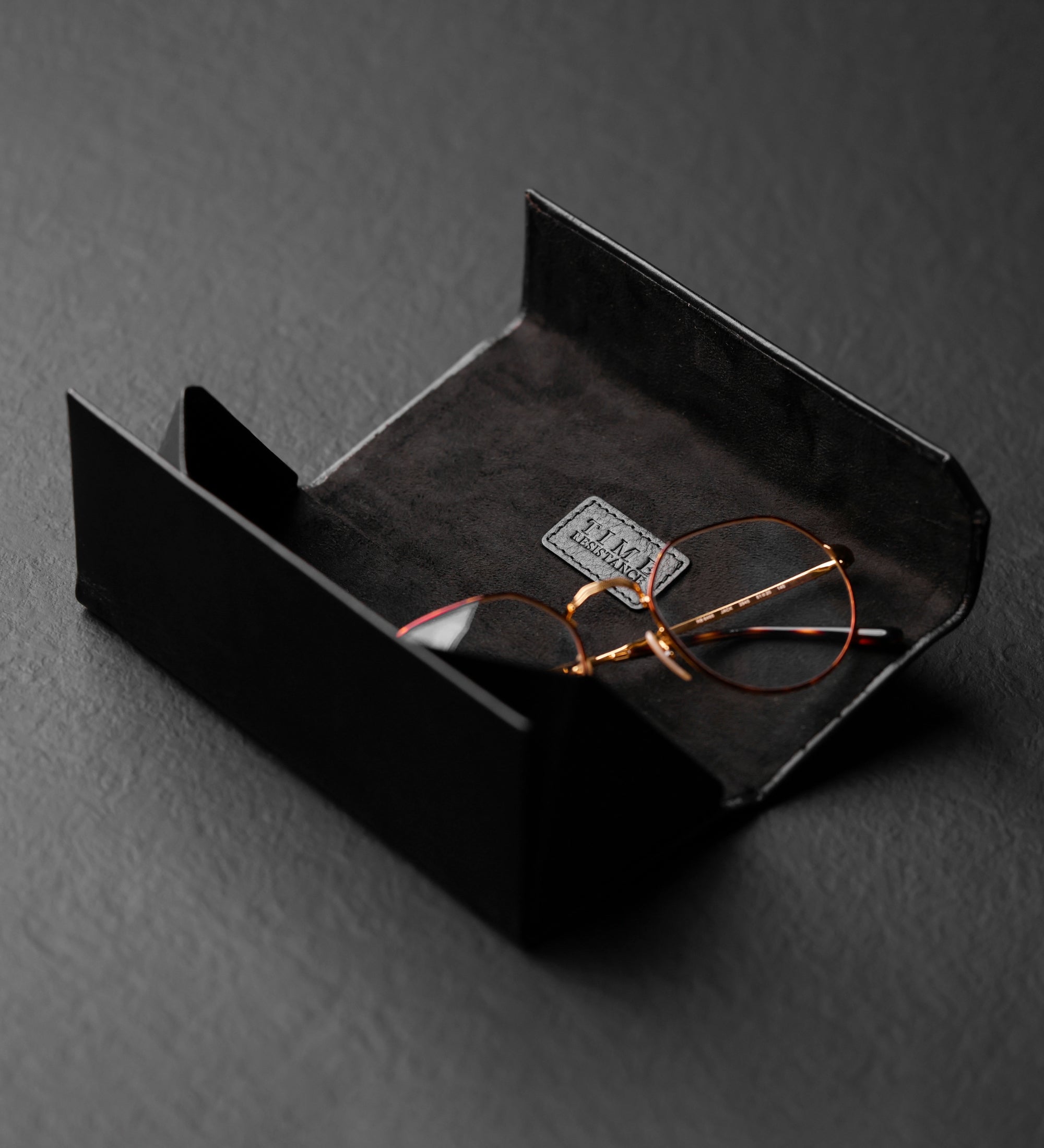 Portaocchiali pieghevole in pelle donna - The Riddle of the Sands